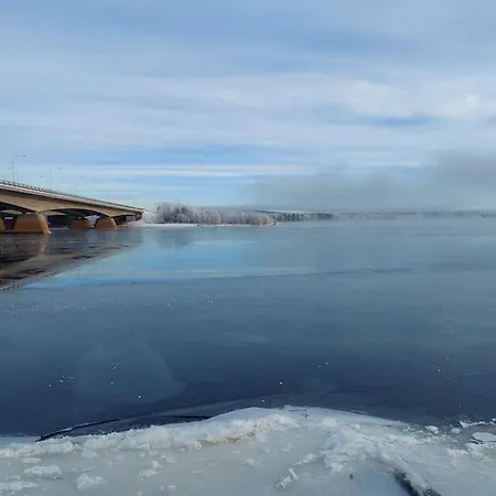 A Riverside Surrounded By Parks Rovaniemi